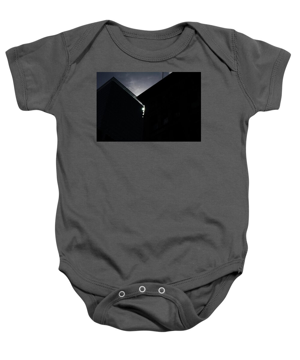 Urban Baby Onesie featuring the photograph Pinhole by Kreddible Trout