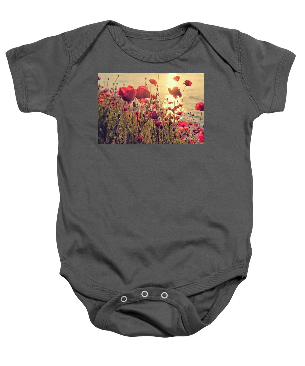 Poppy Baby Onesie featuring the photograph Poppy flowers at sunset by Patricia Hofmeester
