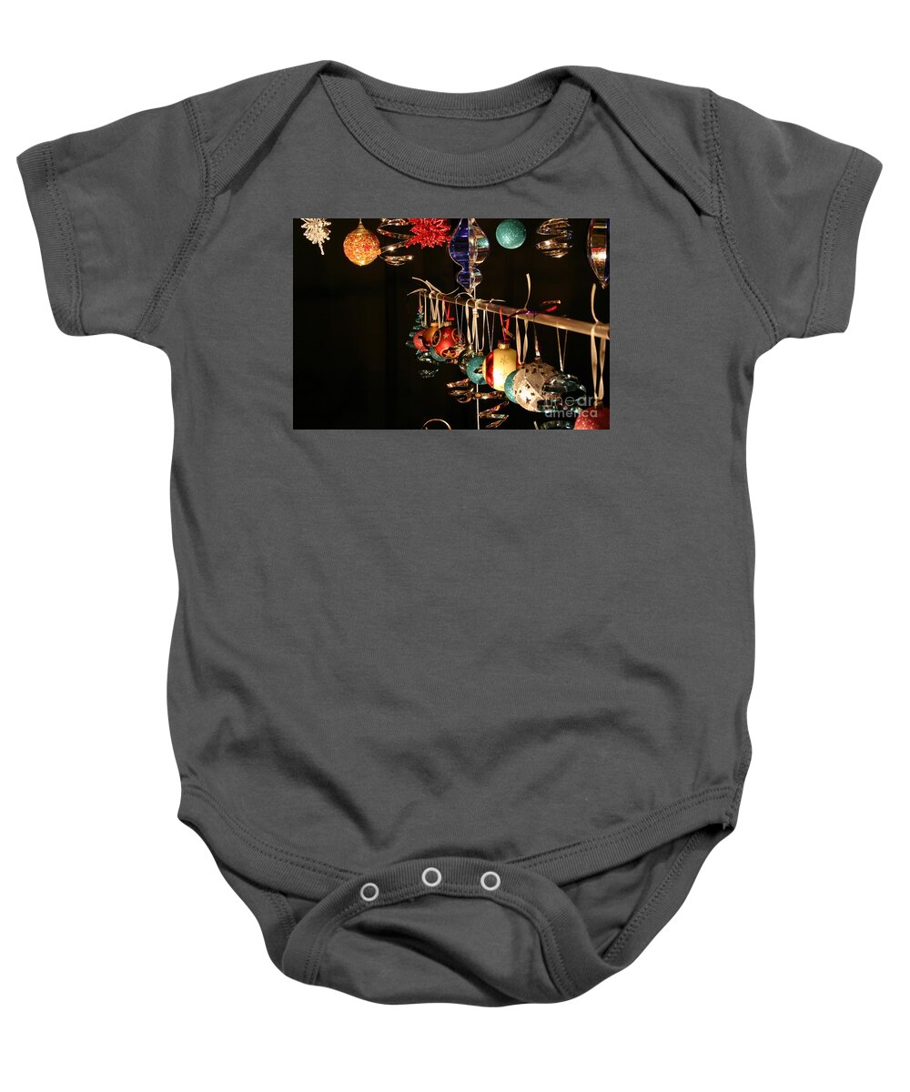 Queue Baby Onesie featuring the photograph Queue up for the holidays by Marie Neder