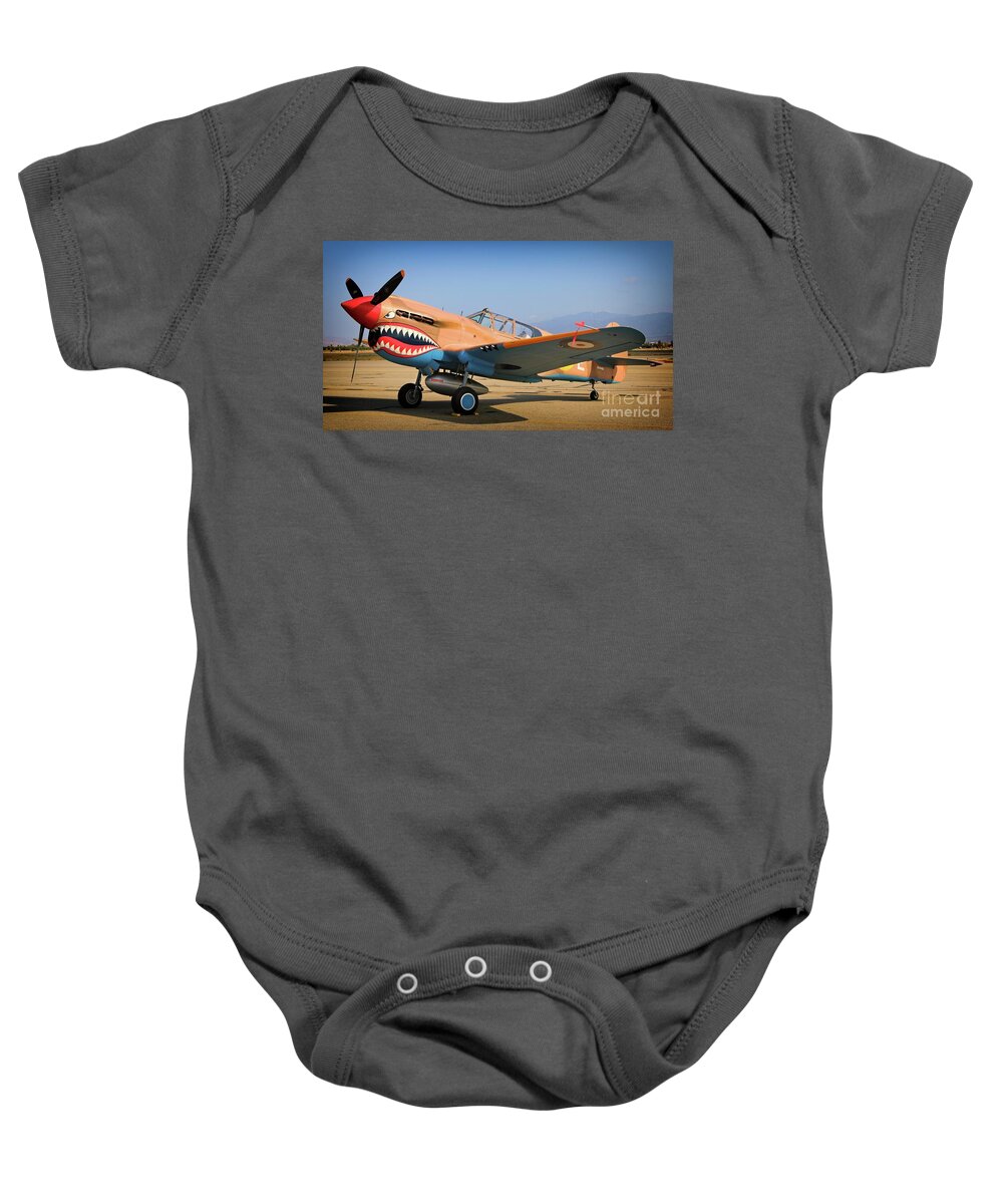 Airplane Baby Onesie featuring the photograph RAF Curtiss-Wright P-40 Warhawk by Gus McCrea
