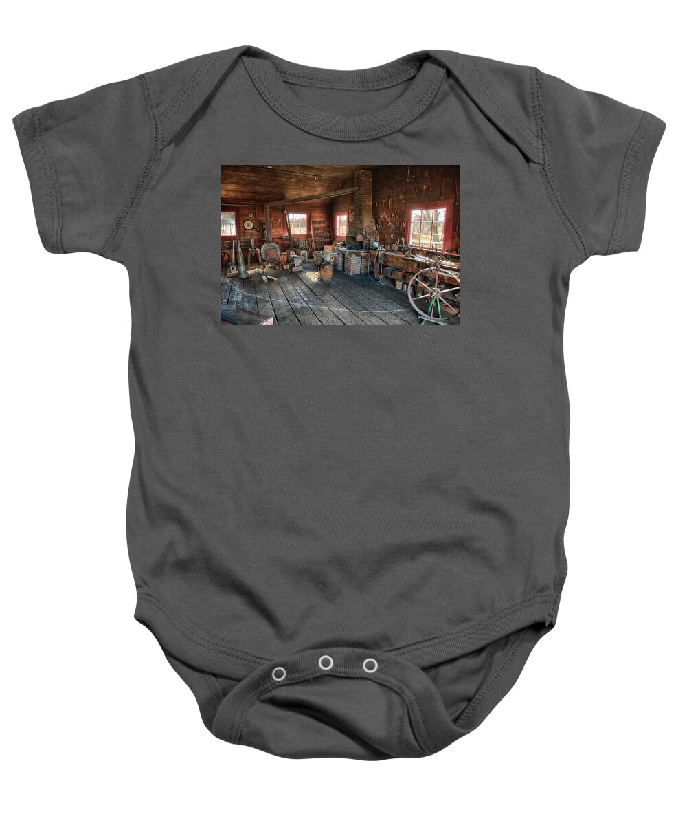 Blacksmith Tools Baby Onesie featuring the photograph Ranch Blacksmith Shop by Paul Freidlund