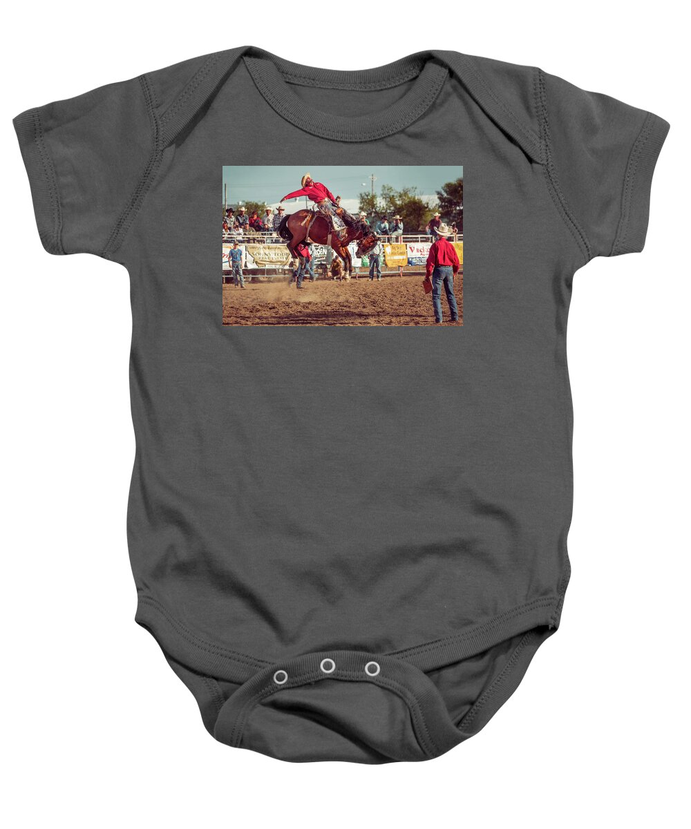 Rodeo Baby Onesie featuring the photograph Rank Ride by Todd Klassy