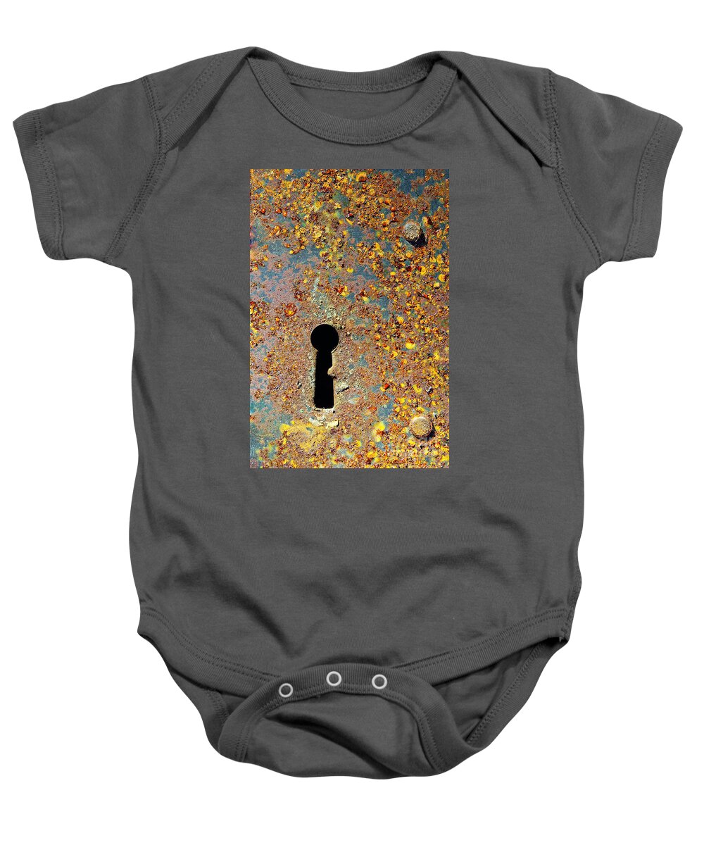 Abandoned Baby Onesie featuring the photograph Rusty key-hole by Carlos Caetano