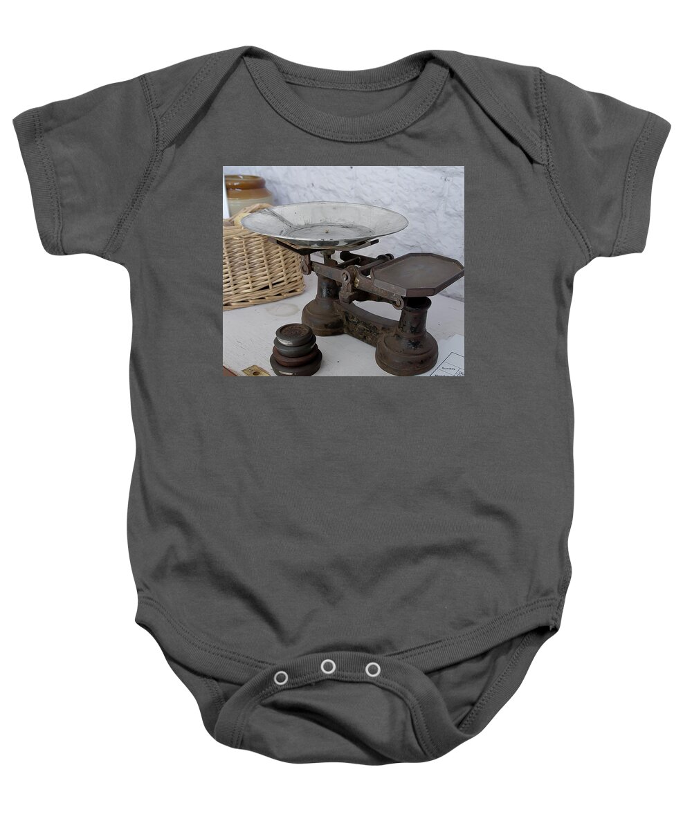 Scales Baby Onesie featuring the photograph Scales and weights by Elena Perelman