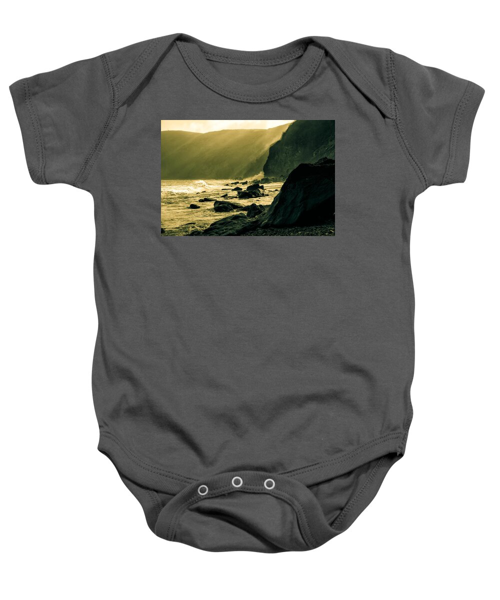Devon Baby Onesie featuring the photograph Sea Fret on Lynmouth Beach in shades of yellow. by John Paul Cullen
