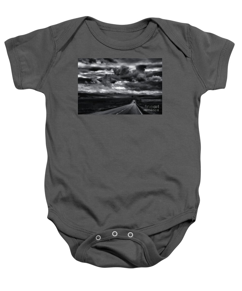 Black And White Baby Onesie featuring the photograph Storm Rider by Lauren Leigh Hunter Fine Art Photography