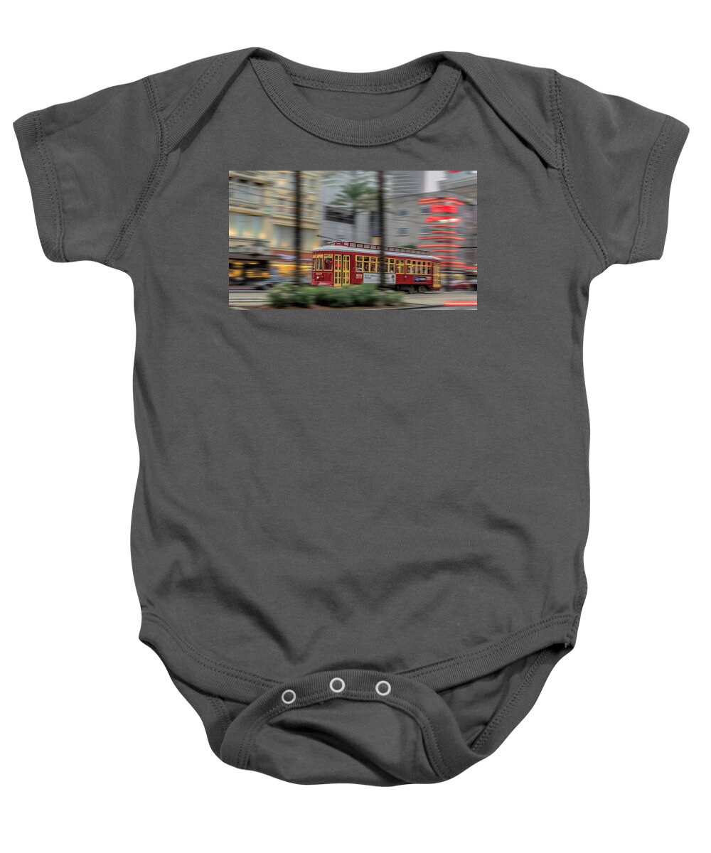 New Orleans Baby Onesie featuring the photograph Street Car Flying Down Canal by Susan Rissi Tregoning