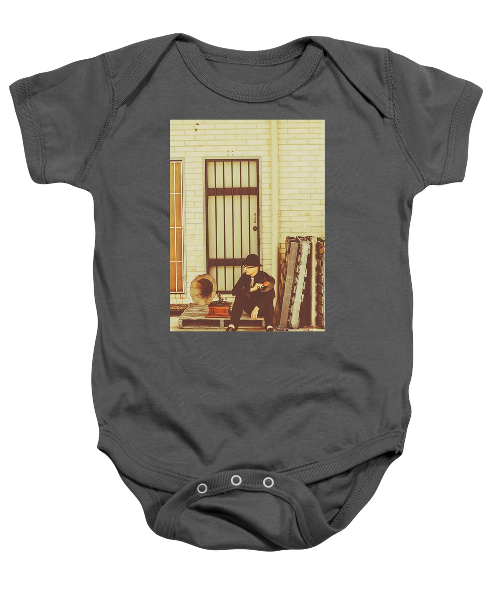 Record Baby Onesie featuring the photograph Stylish man with LP beside gramophone by Jorgo Photography