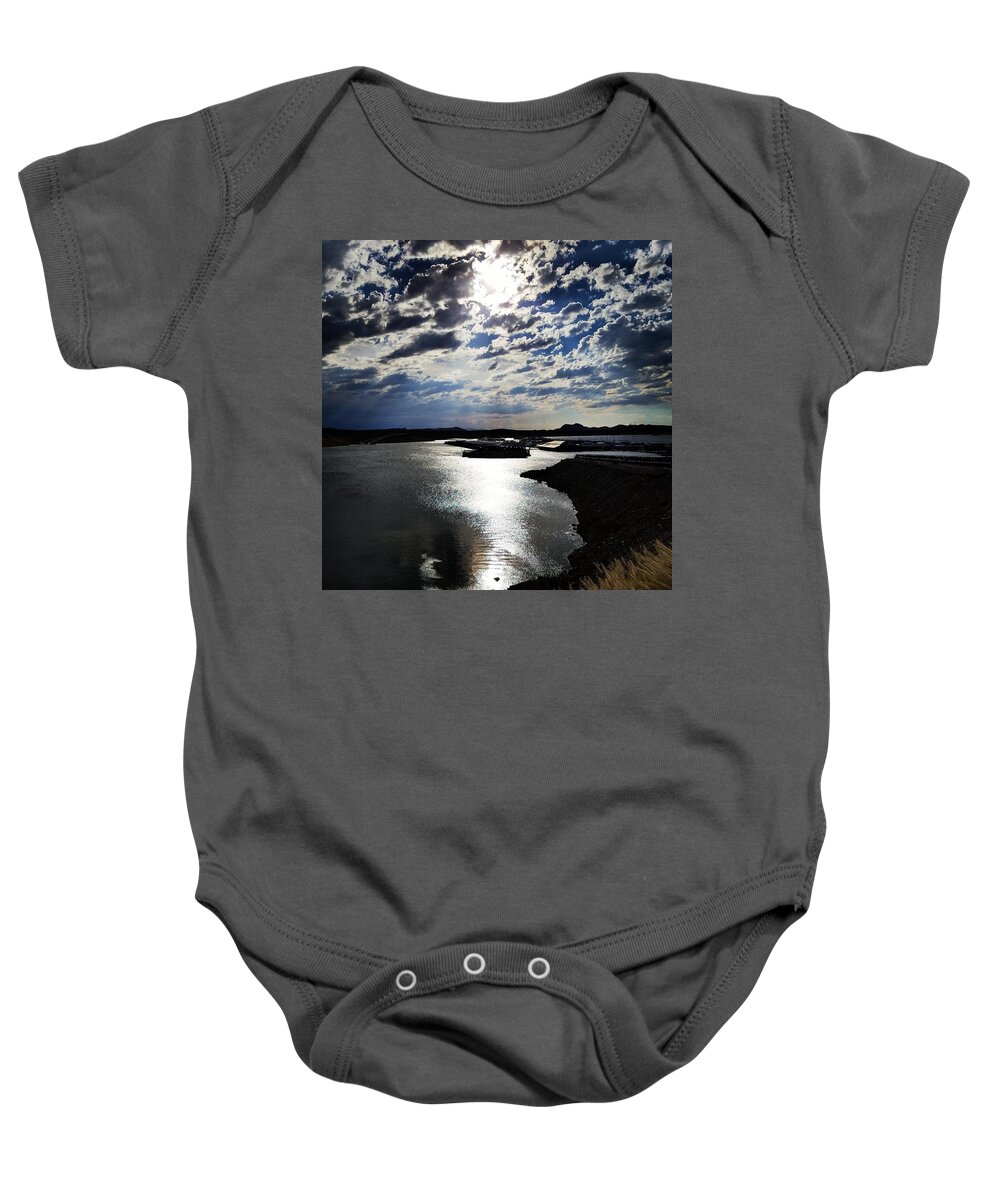 Sun Baby Onesie featuring the photograph Sun Through the Dark Clouds Over the Bay by Vic Ritchey