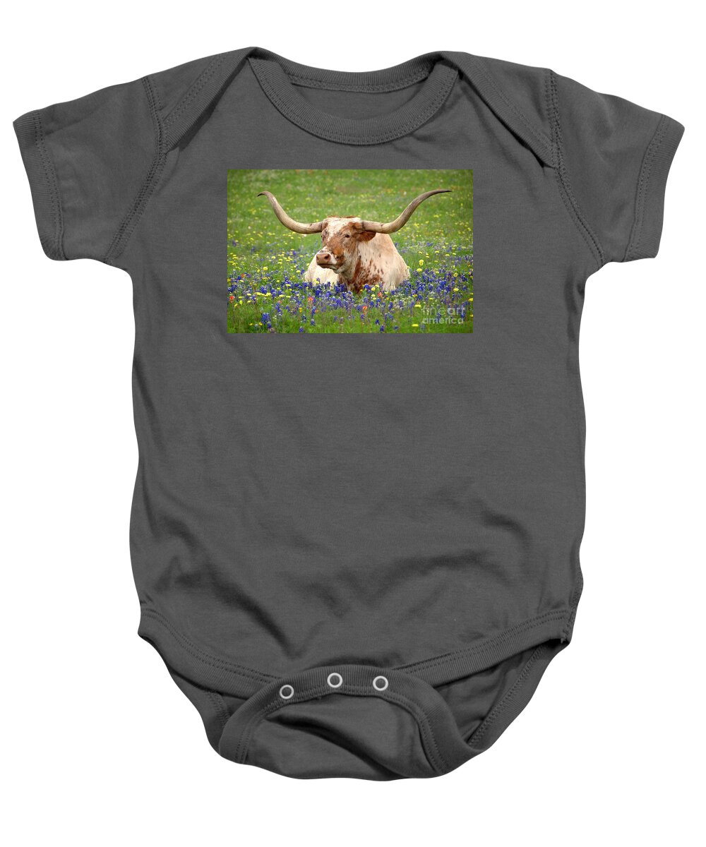 Texas Longhorn In Bluebonnets Baby Onesie featuring the photograph Texas Longhorn in Bluebonnets by Jon Holiday