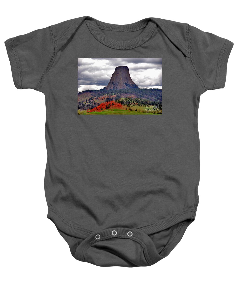 Landmark Baby Onesie featuring the photograph The Devils Tower WY by Susanne Van Hulst