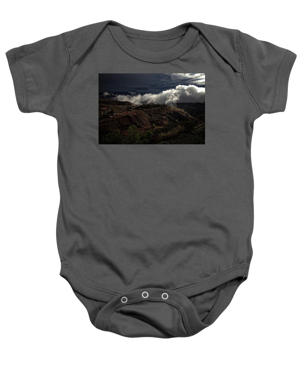 Douglas Mansion Baby Onesie featuring the photograph The Jerome State Park with low lying clouds after storm by Ron Chilston