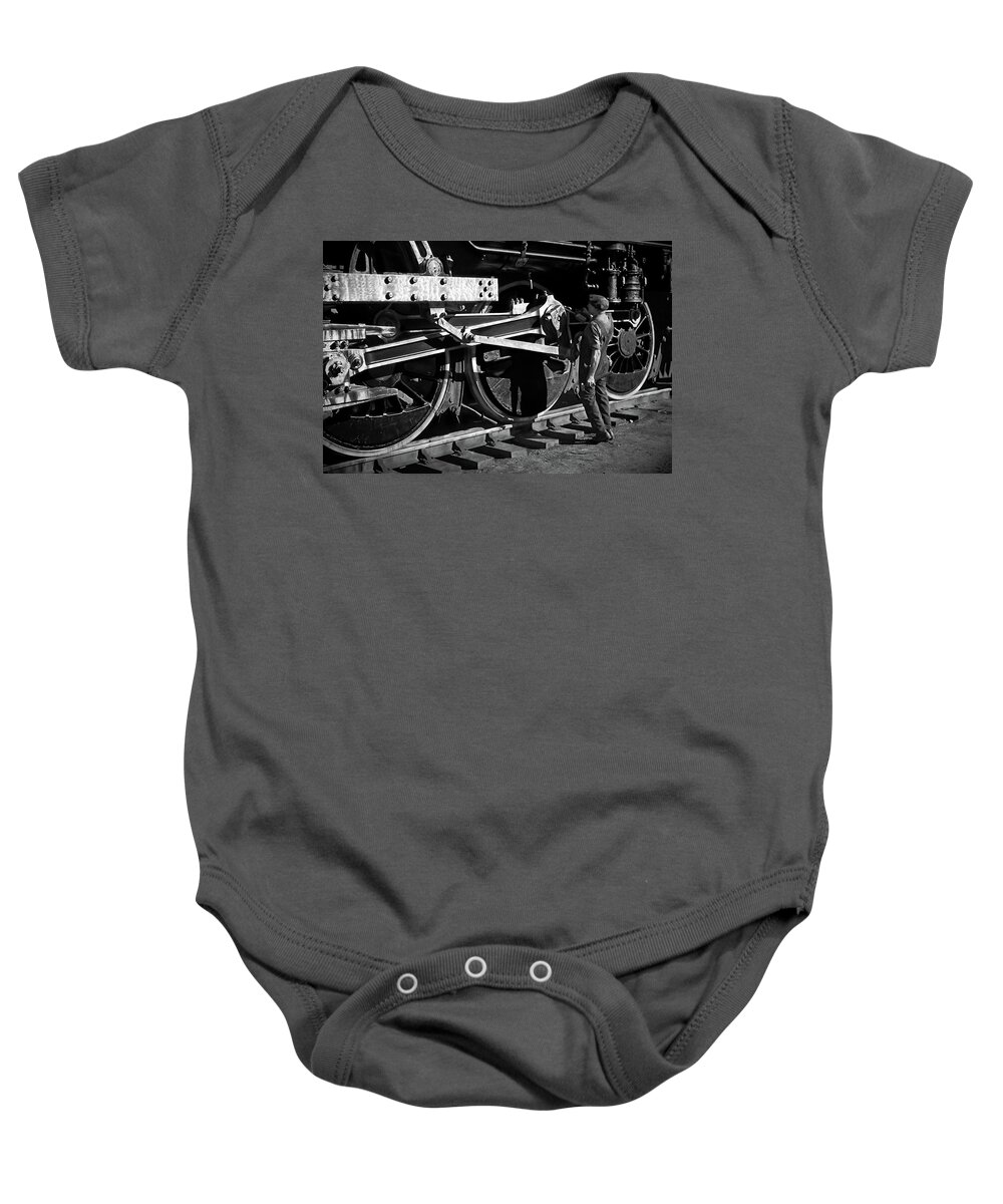 Photorestoration Baby Onesie featuring the photograph The Mechanic by Franchi Torres