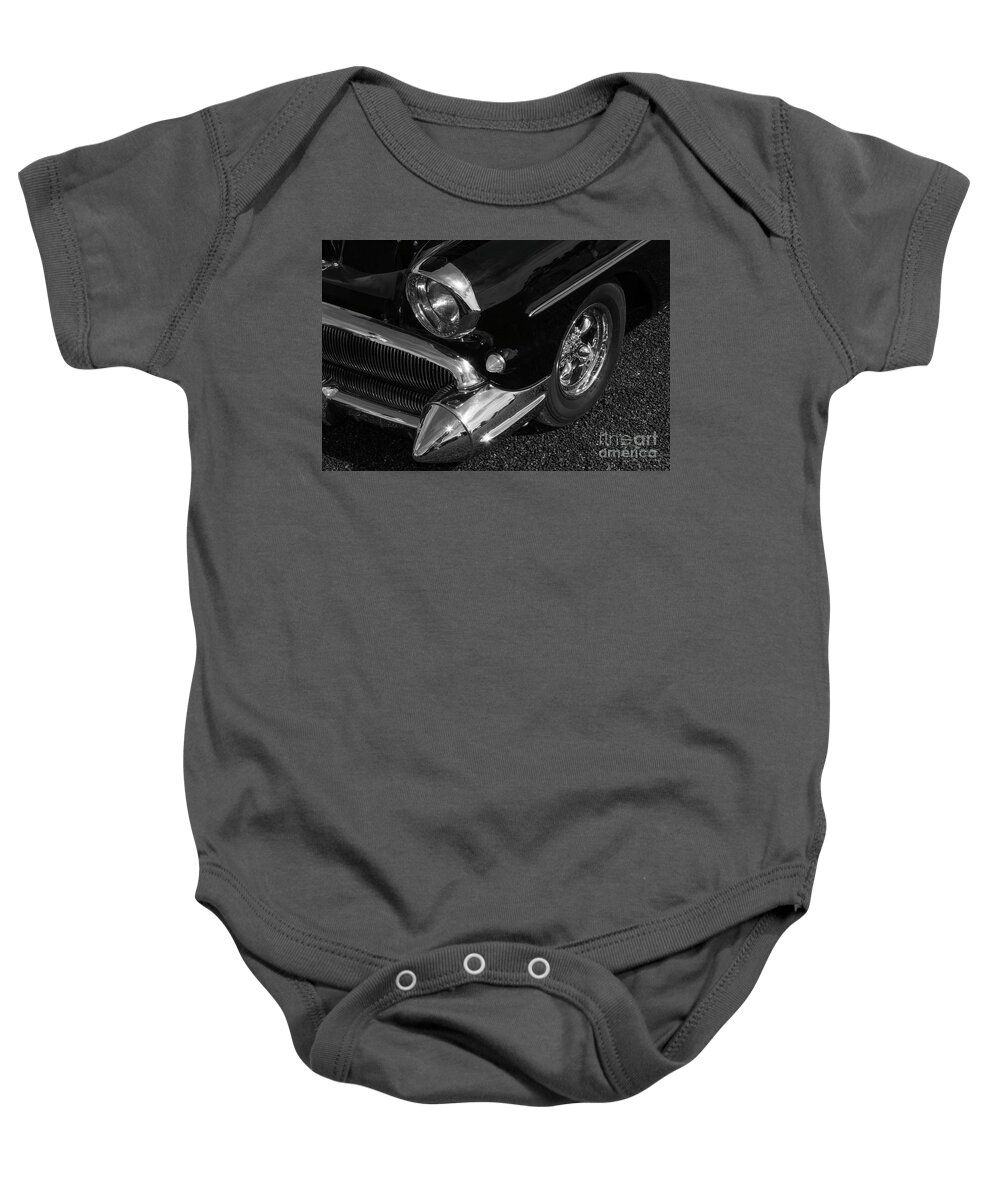 Cars Baby Onesie featuring the photograph The Pointed Chrome Bumper by Kirt Tisdale