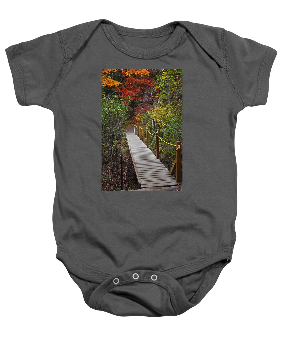 Walden Baby Onesie featuring the photograph Walden Pond Footbridge Concord MA by Toby McGuire