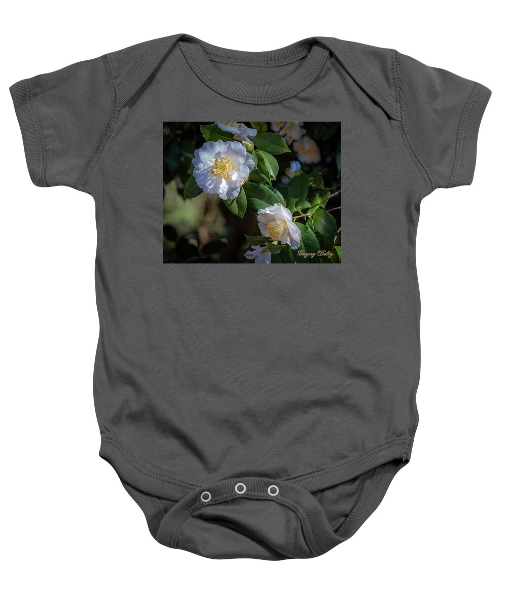 Ul Baby Onesie featuring the photograph White Camelia 02 by Gregory Daley MPSA