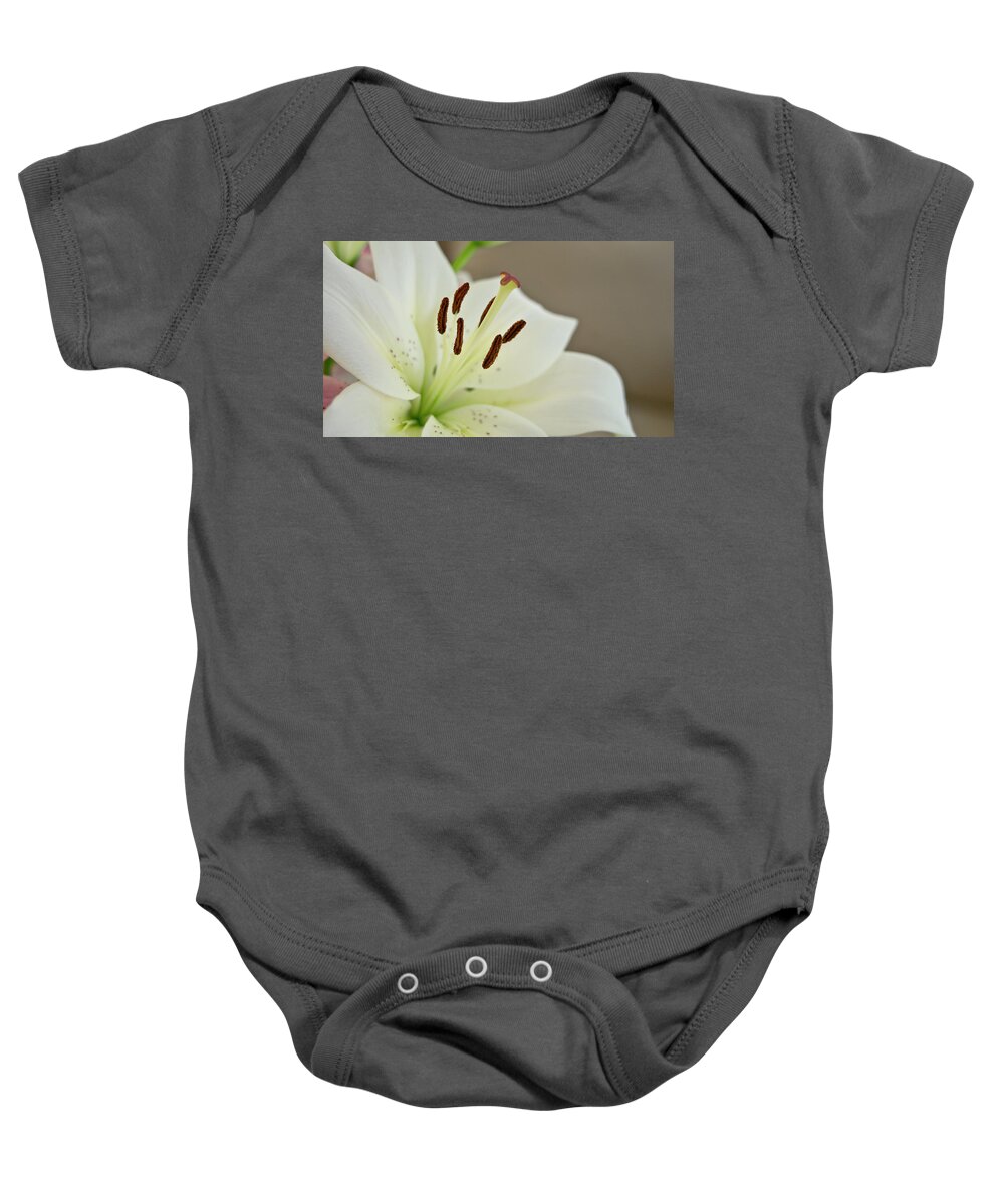 Trinity Baby Onesie featuring the photograph White Lily 4 by Elena Perelman