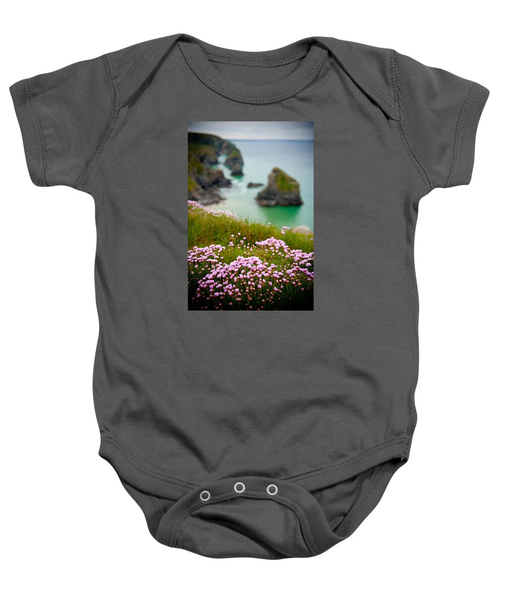 Bedruthen Steps Baby Onesie featuring the photograph Wild Sea Pinks in Cornwall by Helen Jackson