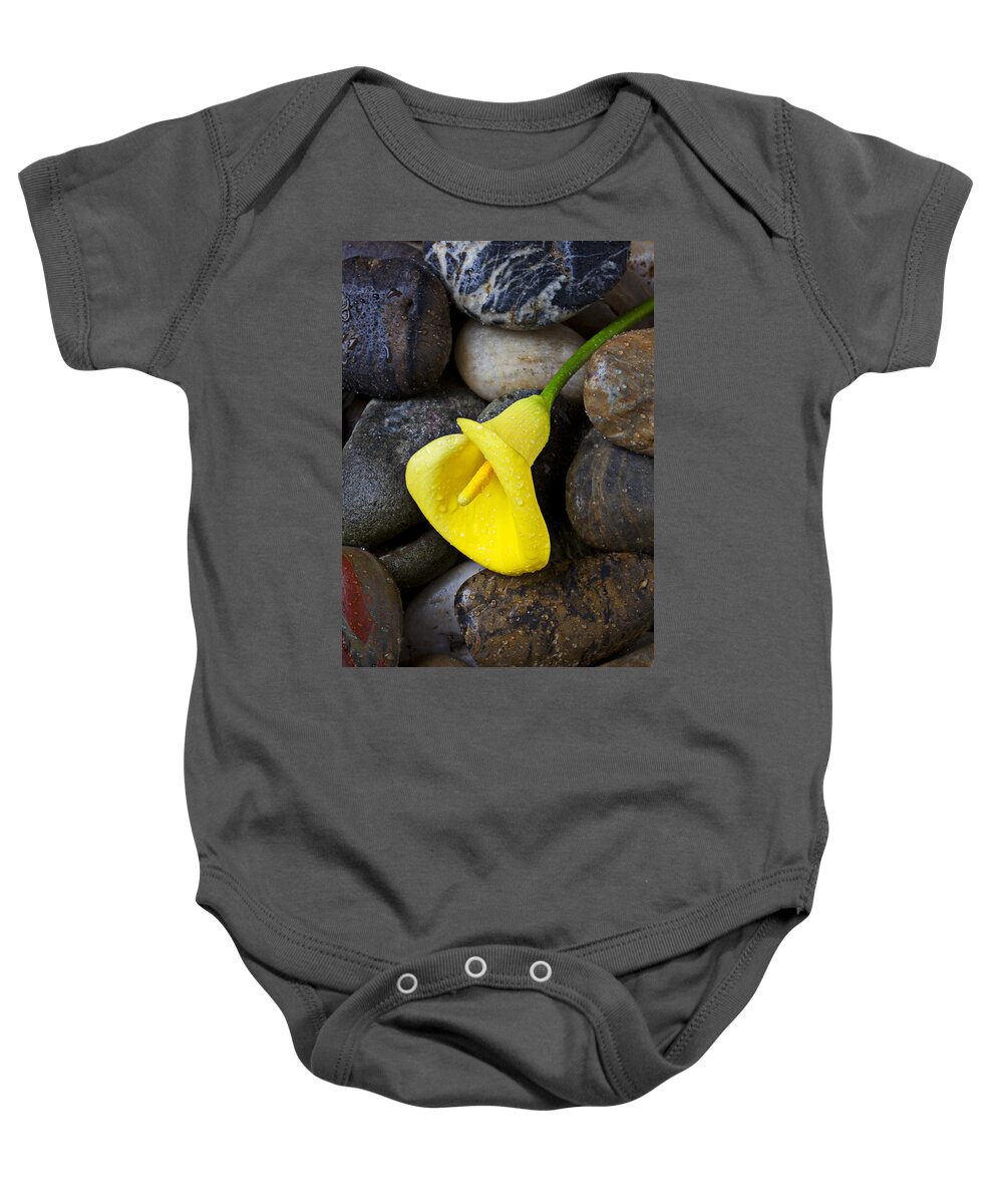 Yellow Baby Onesie featuring the photograph Yellow Calla Lily On Rocks by Garry Gay
