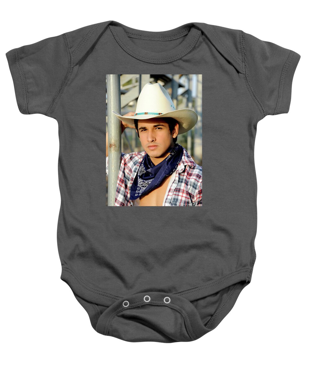 Cowboy Baby Onesie featuring the photograph Young Cowboy in White Cowboy Hat by Gunther Allen