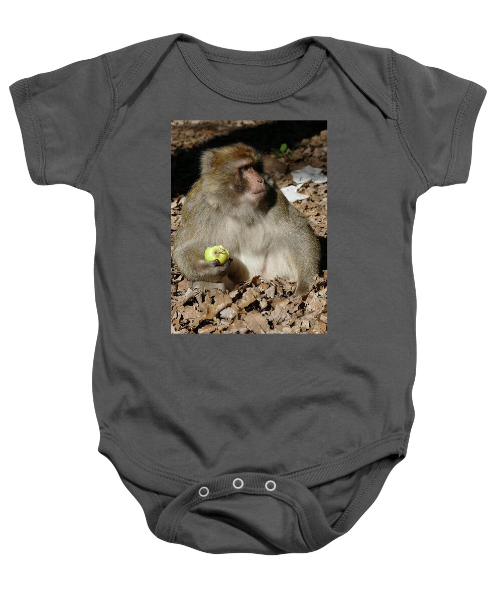 African Baby Onesie featuring the photograph Barbary Macaque by the side of the highway #1 by Steve Estvanik