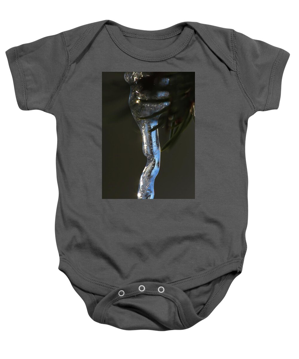 Abstract Baby Onesie featuring the photograph Icicle hanging from a spruce twig #1 by Intensivelight