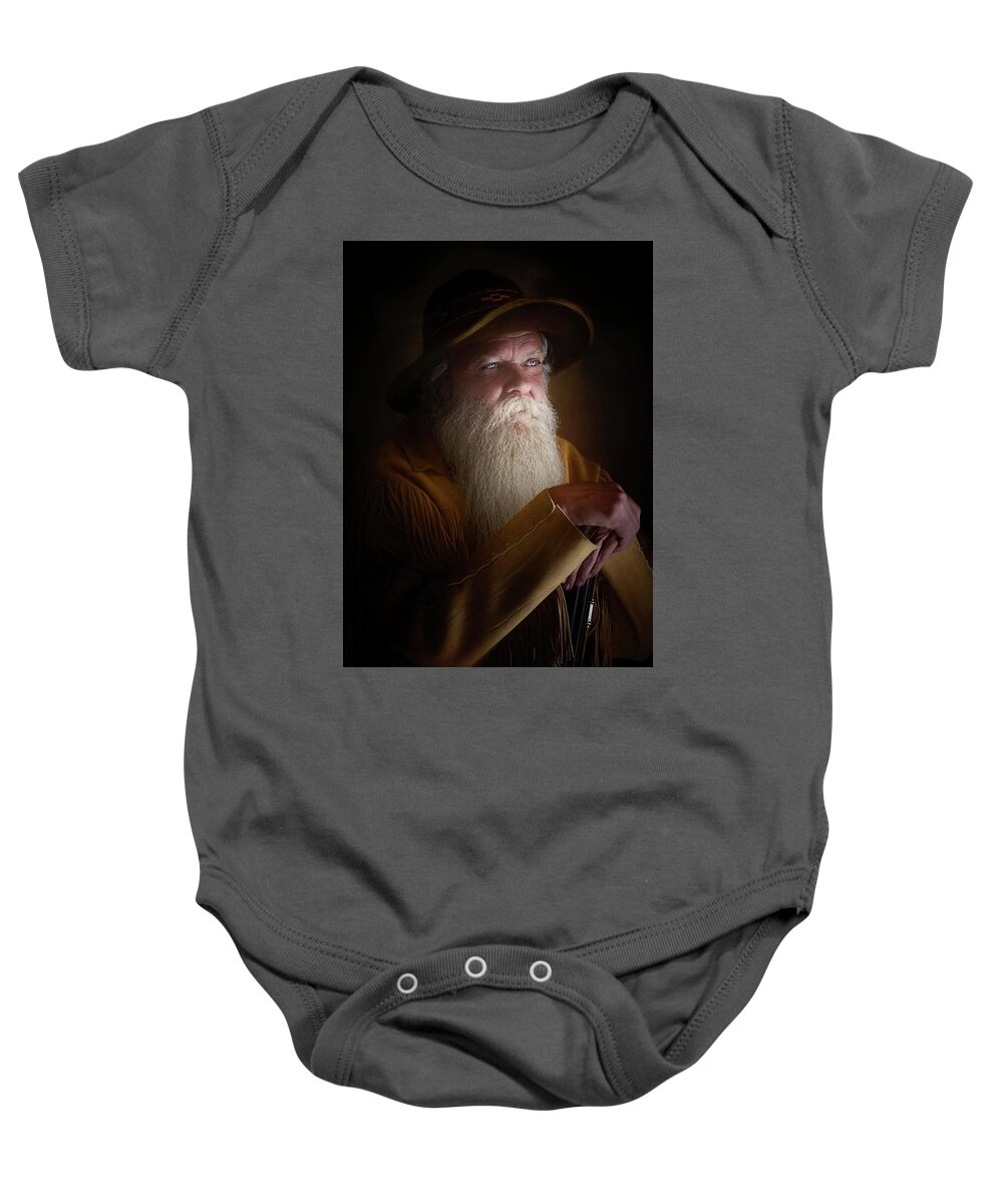 American Mountain Men Baby Onesie featuring the photograph Tracker IV by Debra Boucher