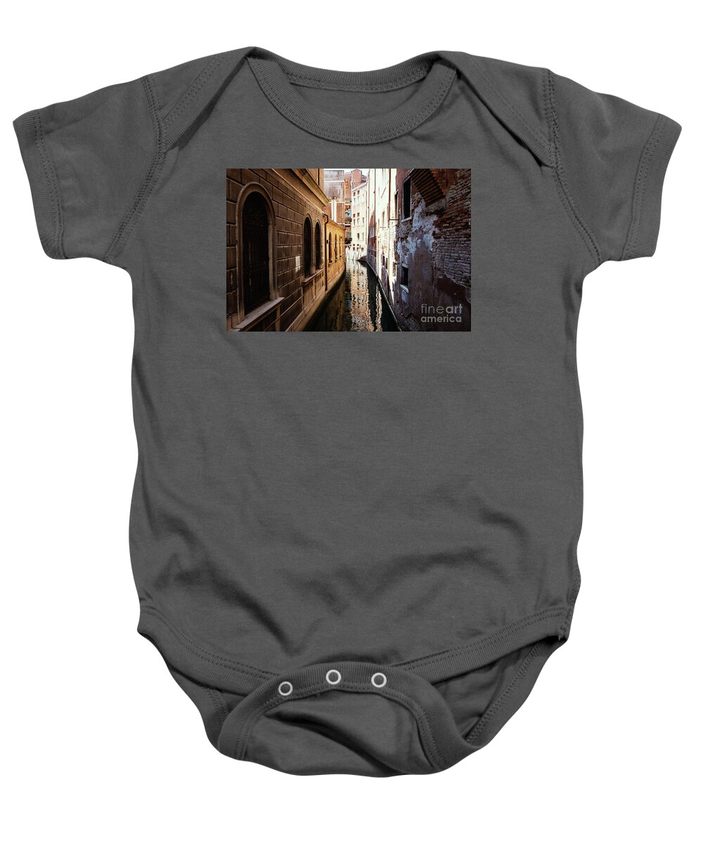 Adriatic Baby Onesie featuring the photograph A shadow in the venetian noon narrow canal by Marina Usmanskaya