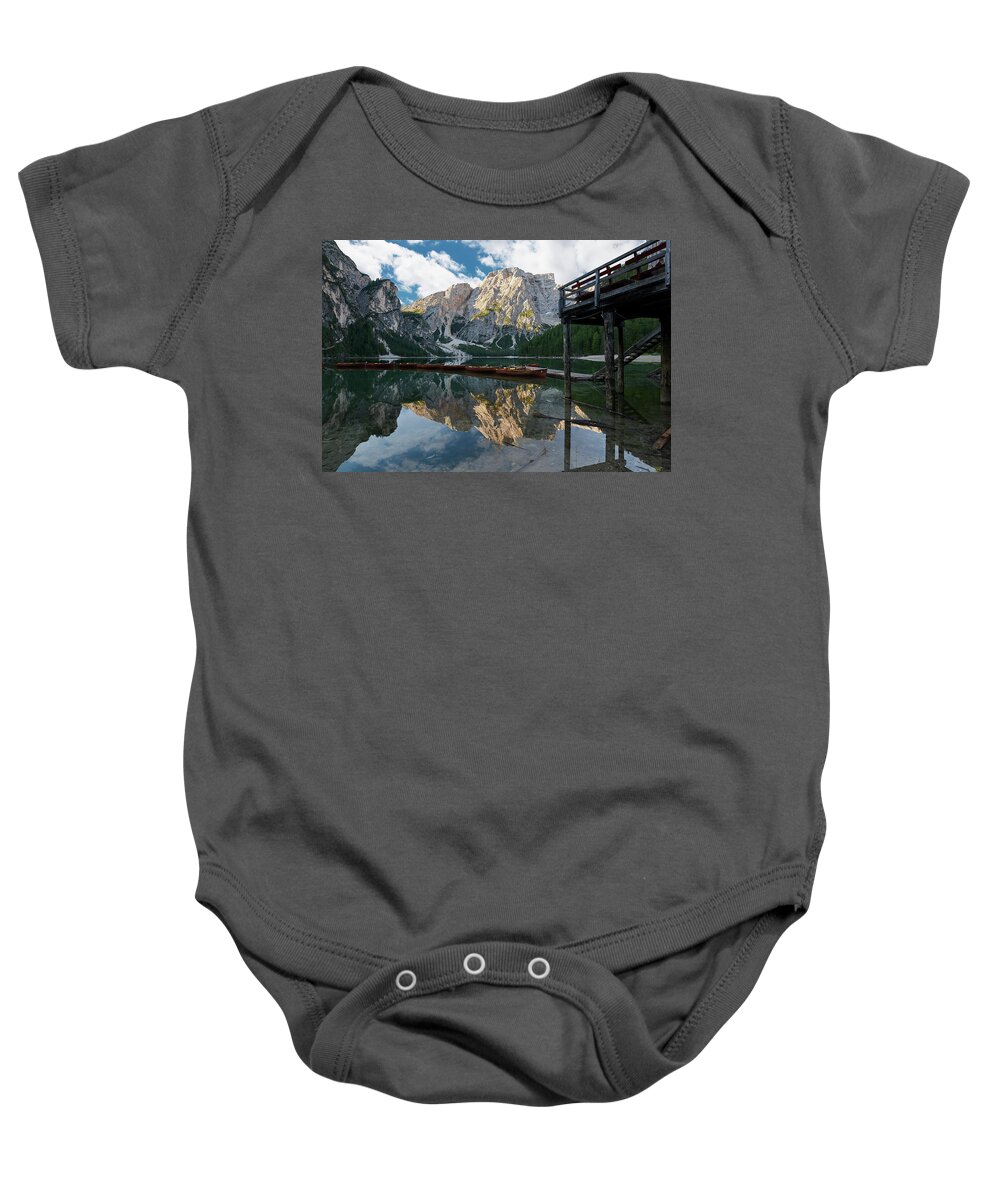 Lago De Braies Baby Onesie featuring the photograph Boathouse at Lago Di Braies by Jon Glaser