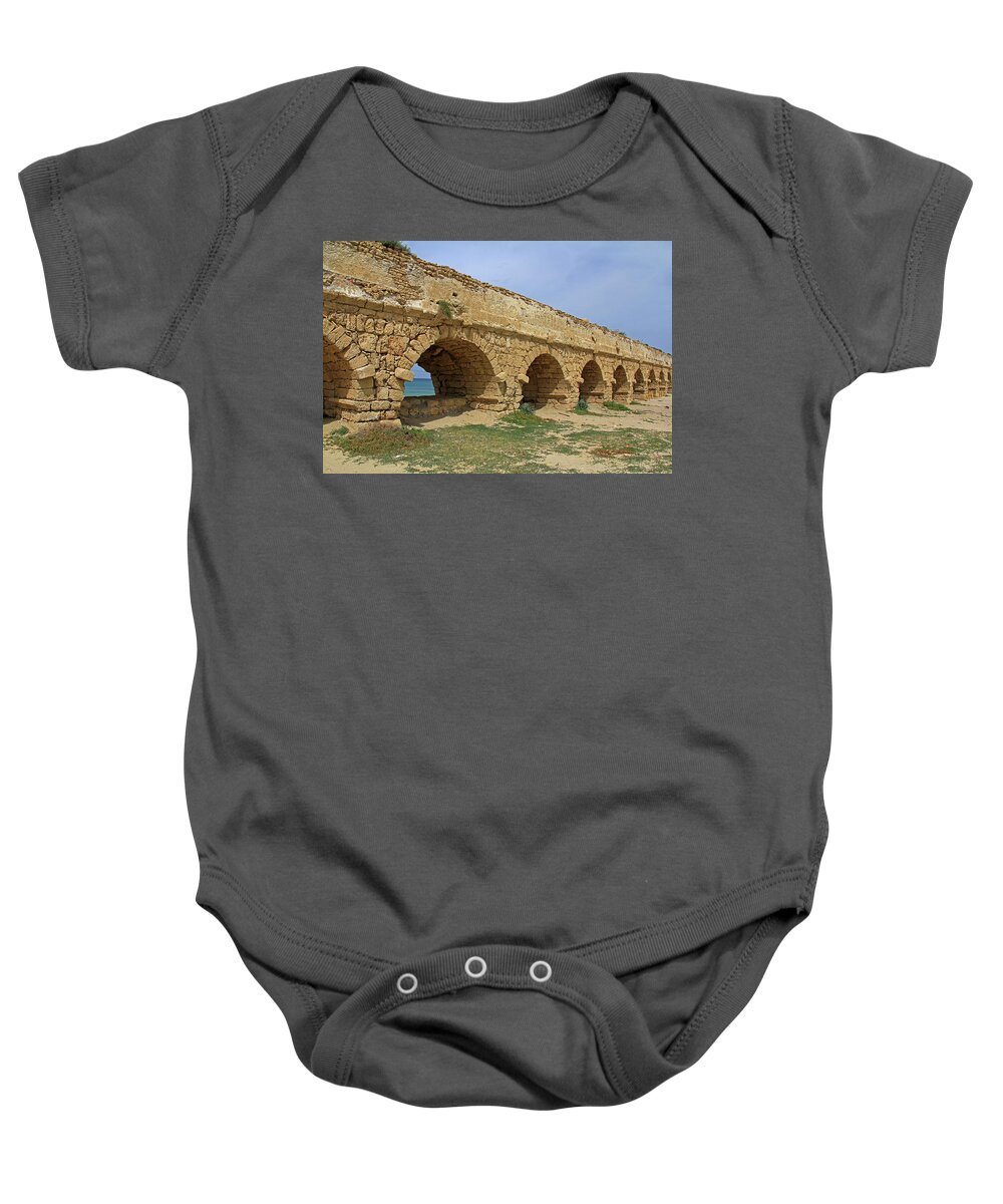 Caesarea Baby Onesie featuring the photograph Caesarea Aqueduct - Caesarea, Israel by Richard Krebs