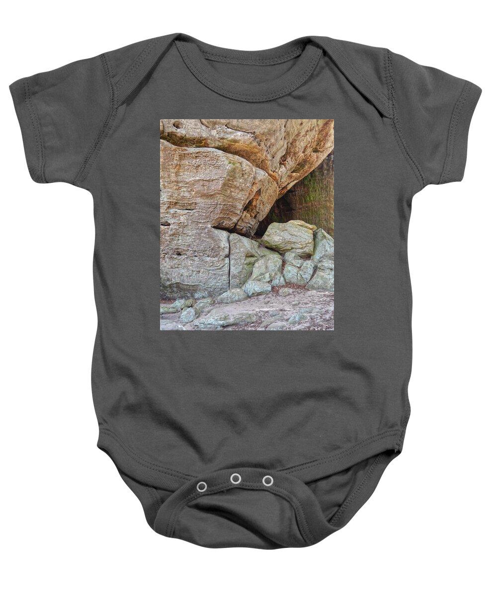 Cliff Baby Onesie featuring the photograph Cave In A Cliff by Phil Perkins