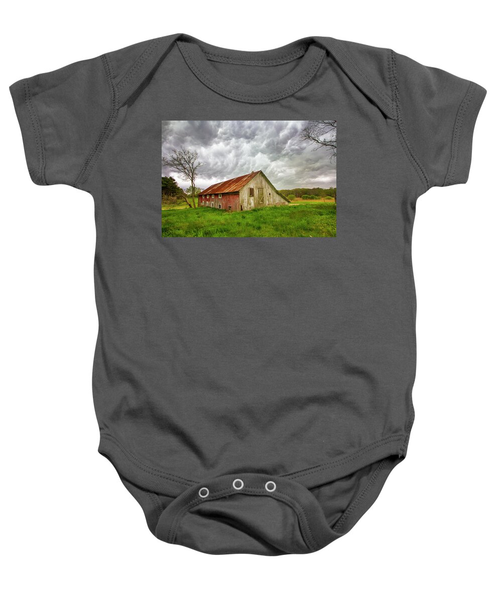 East Moriches Red Barn Storm Clouds Spring Green Grass Farm Field Stormy Rural Long Island New York Baby Onesie featuring the photograph East Moriches Red Barn Storm by Robert Seifert