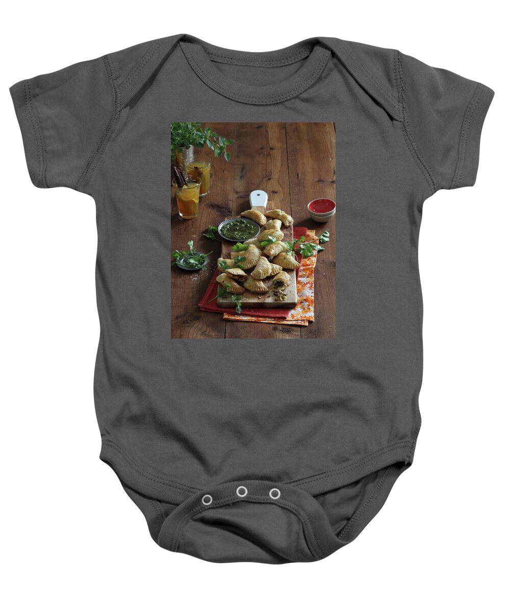 Ip_11411880 Baby Onesie featuring the photograph Empanadas With Chimi-churri Sauce by Great Stock!