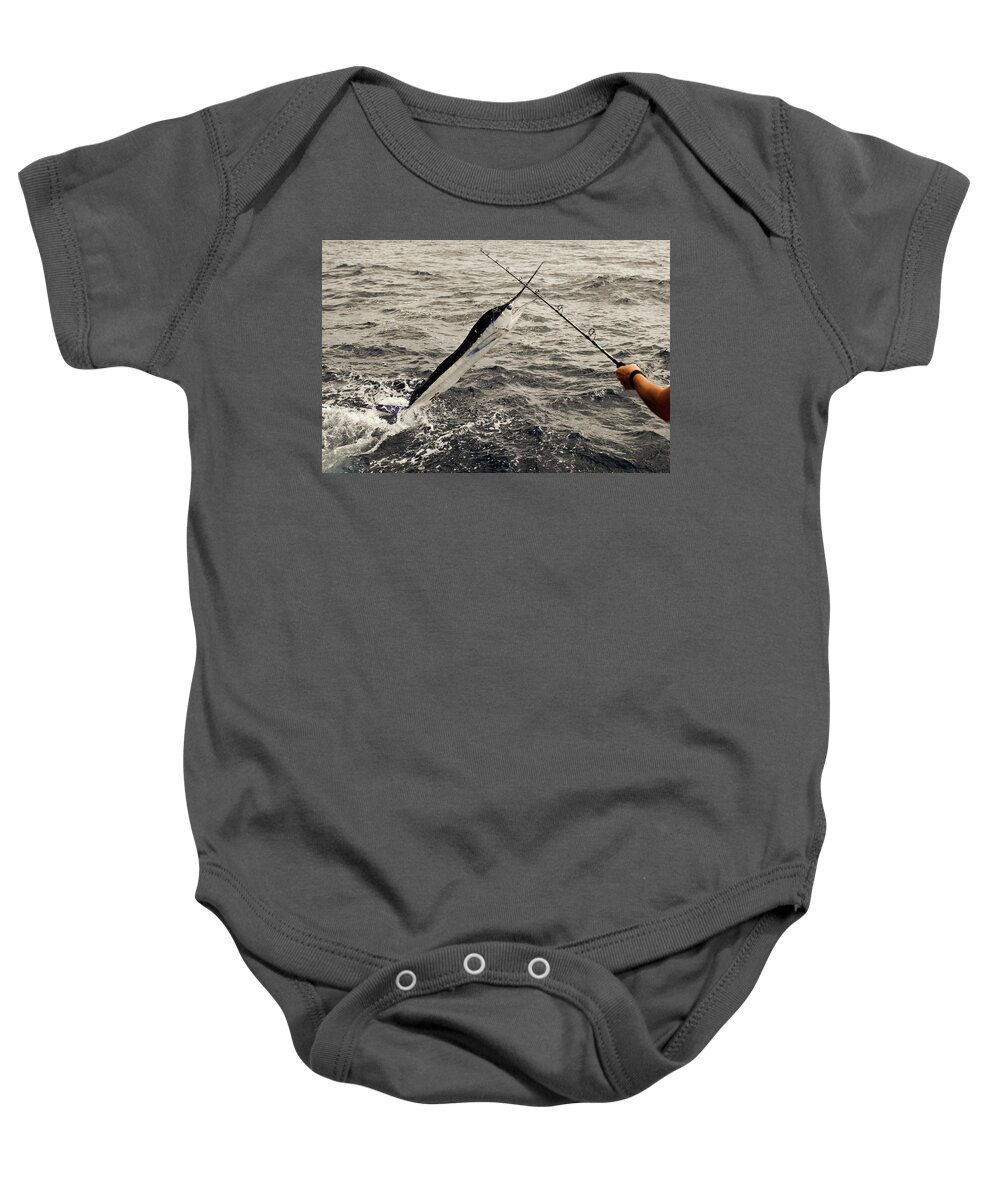 Stripped Marlin Baby Onesie featuring the photograph Fisherman and Marlin battle off stern of sport fishing boat by David Shuler