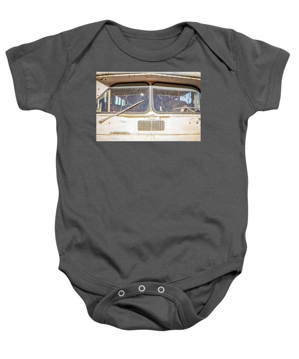 Junkyard Baby Onesie featuring the photograph Front of an old Bus in a junkyard by Edward Fielding