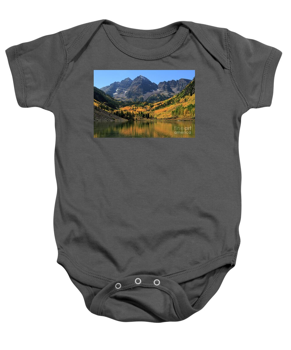 Maroon Bells Baby Onesie featuring the photograph Maroon Bells in Fall by Paula Guttilla