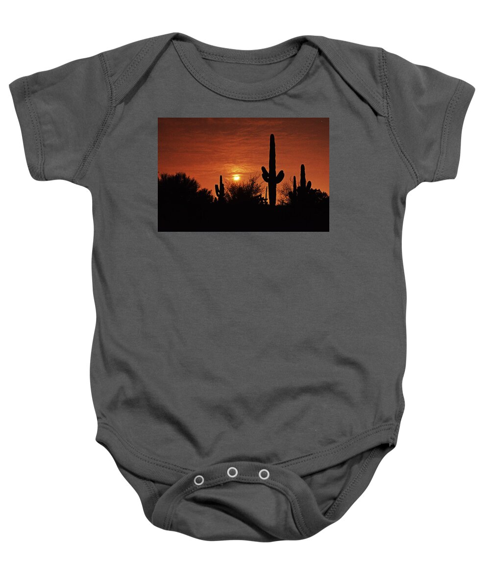 Moon Baby Onesie featuring the photograph Moonset in the desert by Chance Kafka