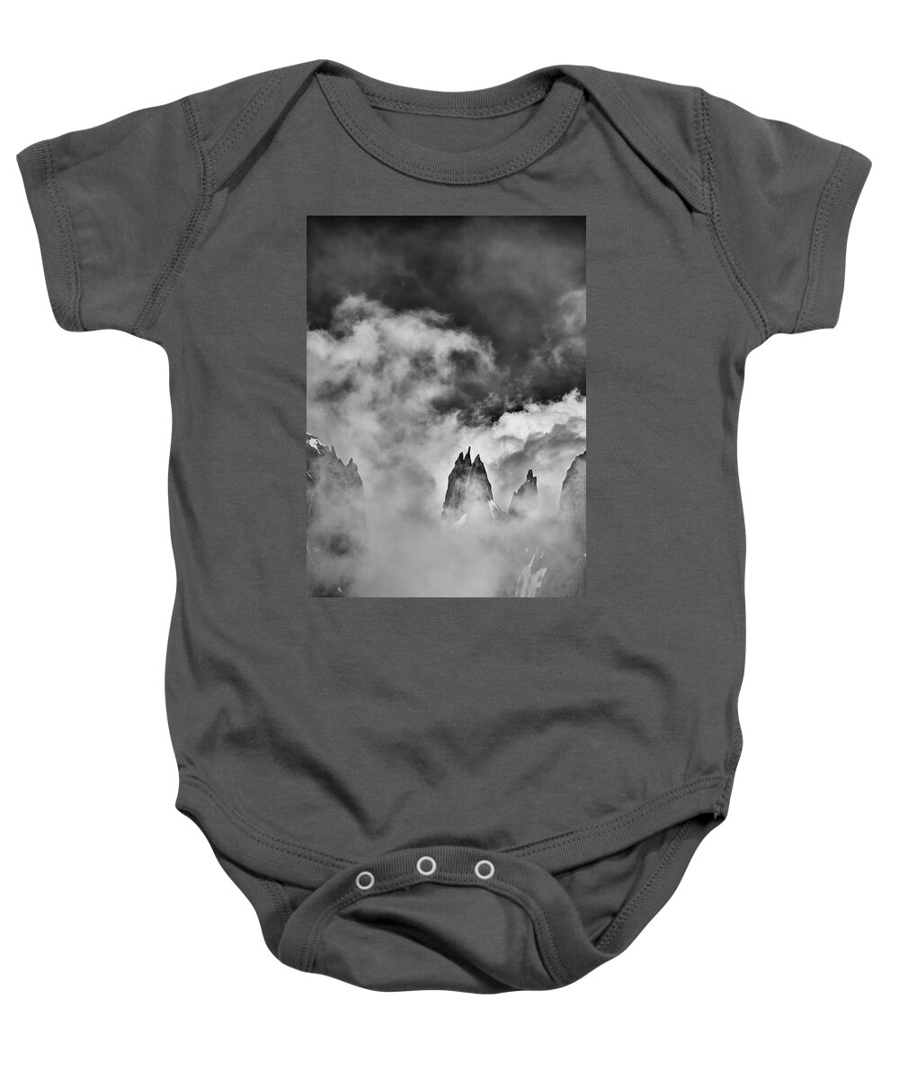 Courmayeur Baby Onesie featuring the photograph Sneaking Thru the Clouded Alps II by Jon Glaser