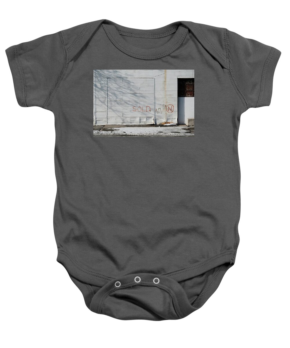 Urban Baby Onesie featuring the photograph Sold by Kreddible Trout