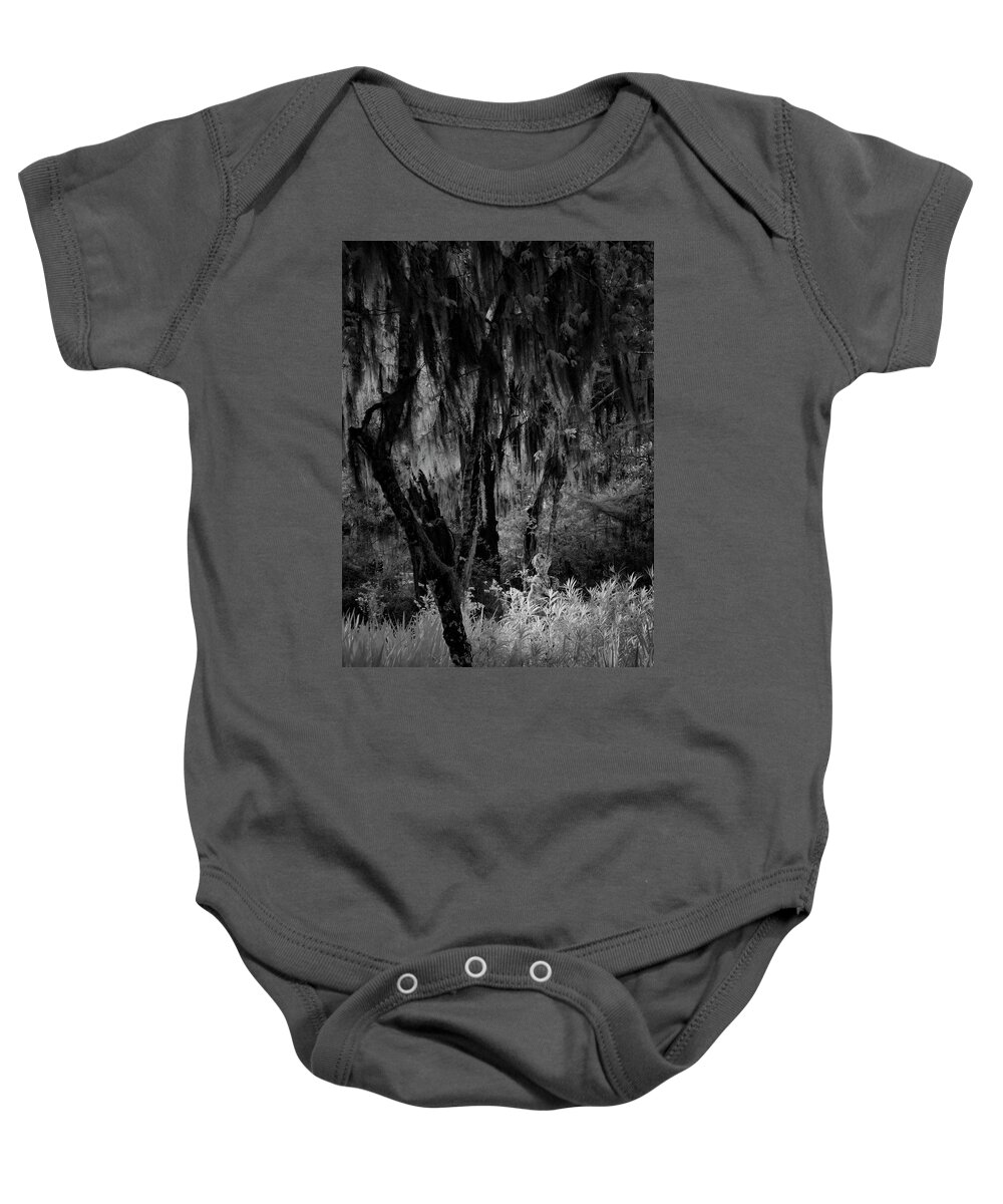 Black And White Baby Onesie featuring the photograph Statue in the Grass by Jon Glaser