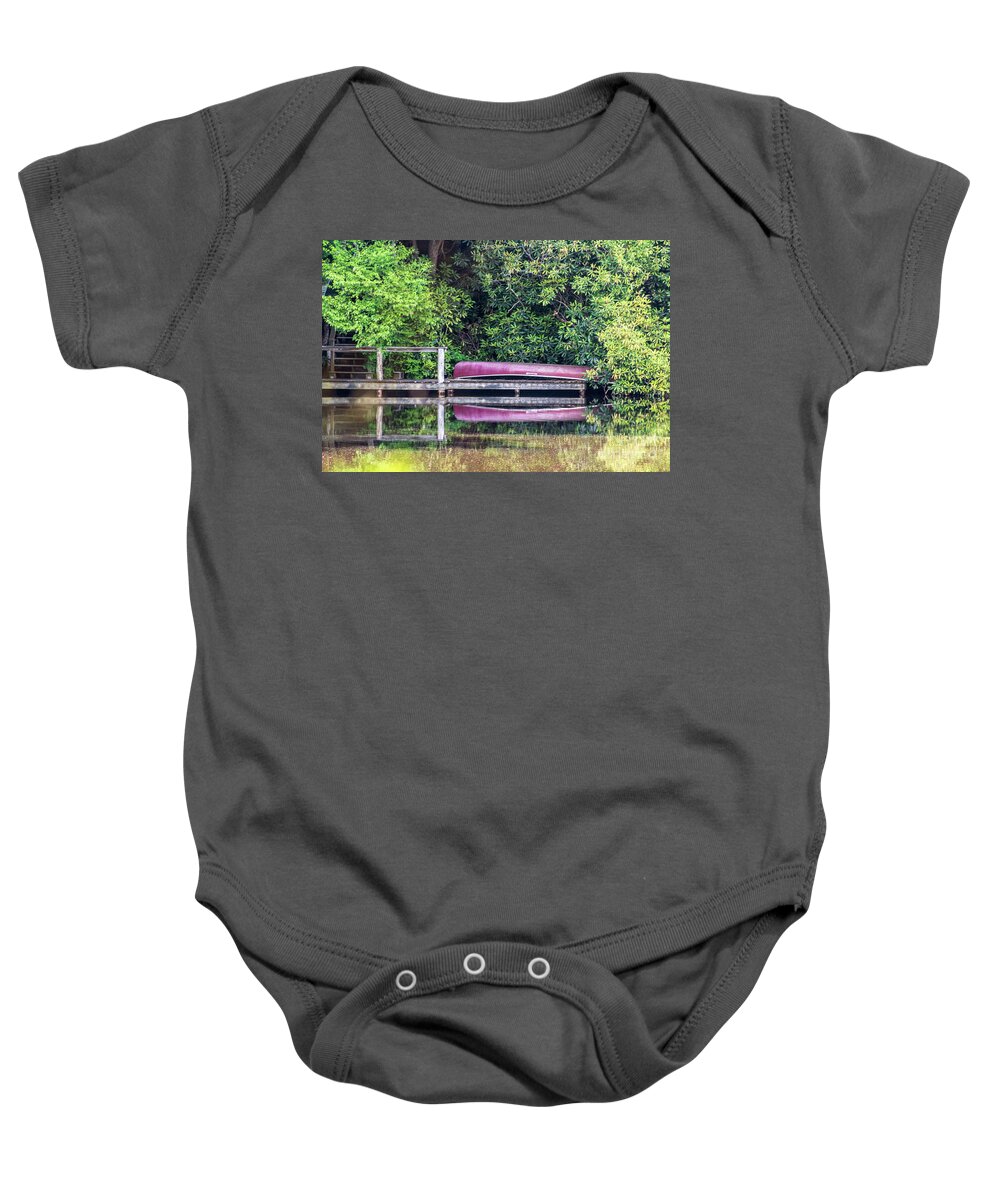 Canoe Baby Onesie featuring the photograph Waiting on a rider by Cynthia Clark