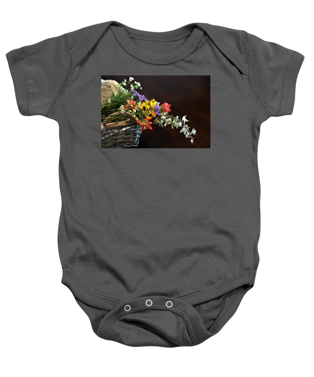 Nature Baby Onesie featuring the photograph Wildflowers in a Basket on Black by Sheila Brown