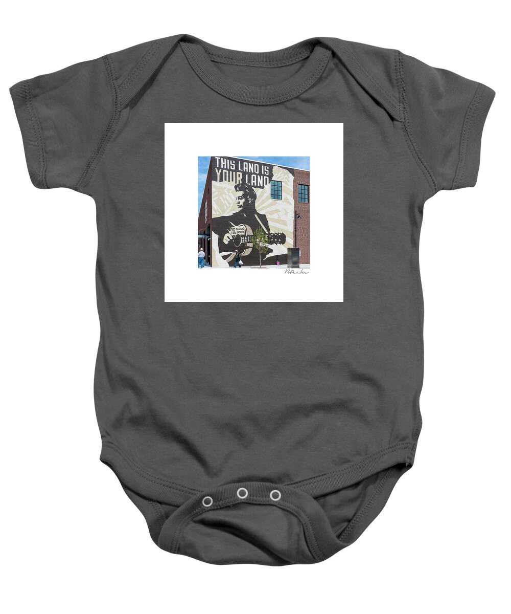 Woody Baby Onesie featuring the photograph Woody Guthrie Center 8x8 by Bert Peake
