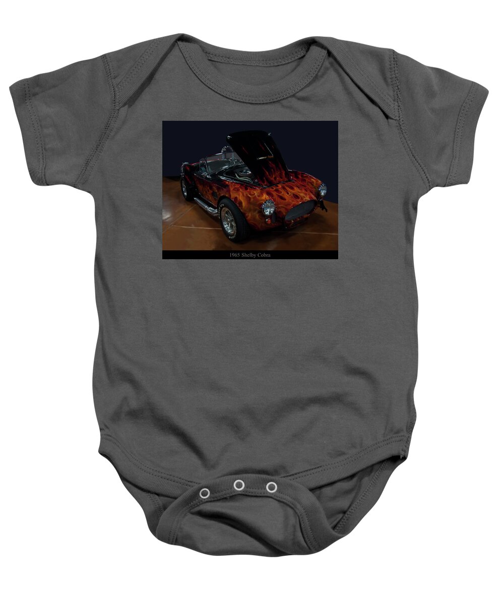 1965 Shelby Cobra Baby Onesie featuring the photograph 1965 Shelby Cobra by Flees Photos