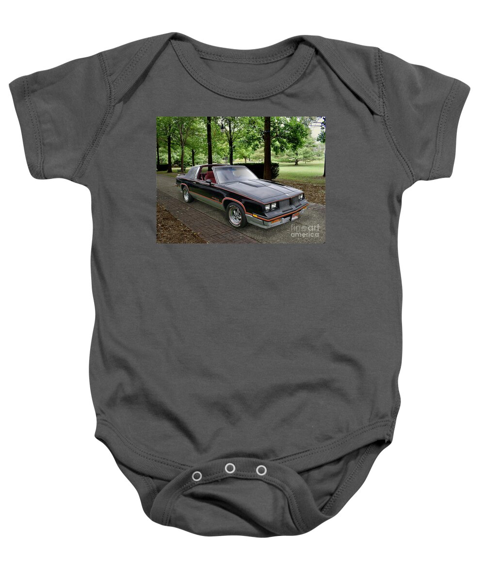 1983 Baby Onesie featuring the photograph 1983 Hurst Olds by Ron Long