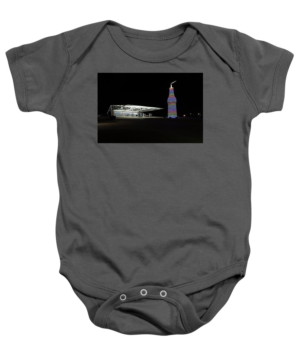  Baby Onesie featuring the photograph Pops 66 Soda Ranch in Arcadia Oklahoma at night by Eldon McGraw