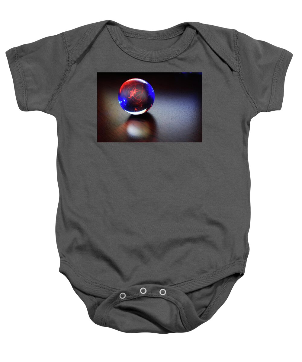 Magic Baby Onesie featuring the photograph A fortune teller's crystal ball by Maria Dimitrova
