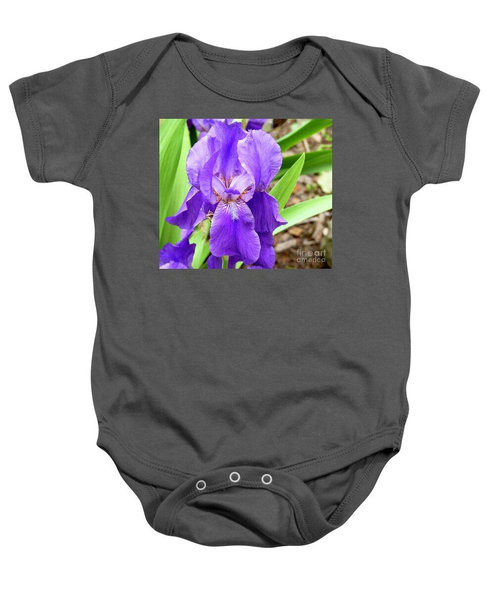 Sold Baby Onesie featuring the photograph A Look In The Iris by Linda Brittain