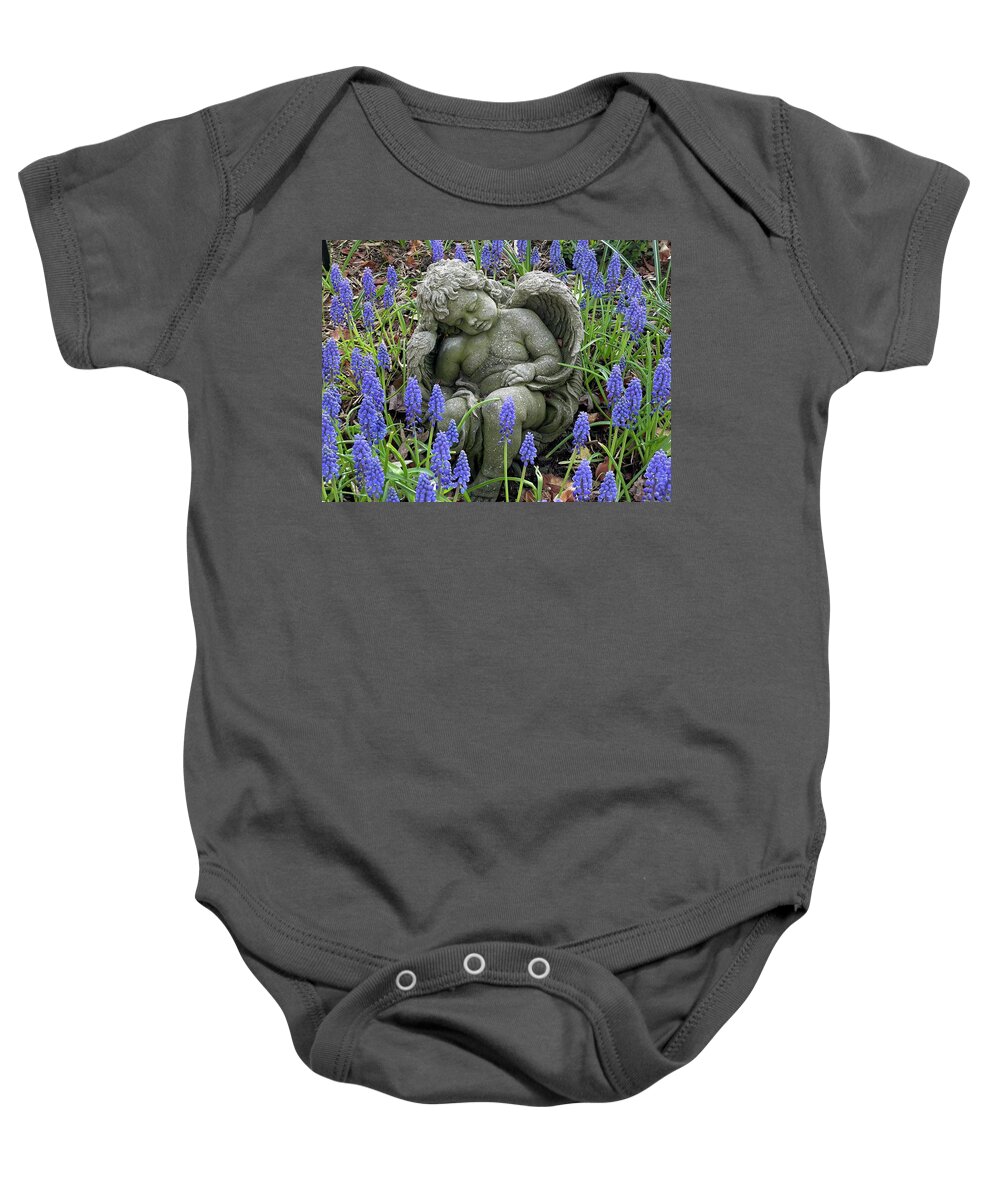 A Sleeping Angel Surrounded By Grape Hyacinths In The Garden. Baby Onesie featuring the photograph Asleep Amongst the Hyacinths by Charles Kraus