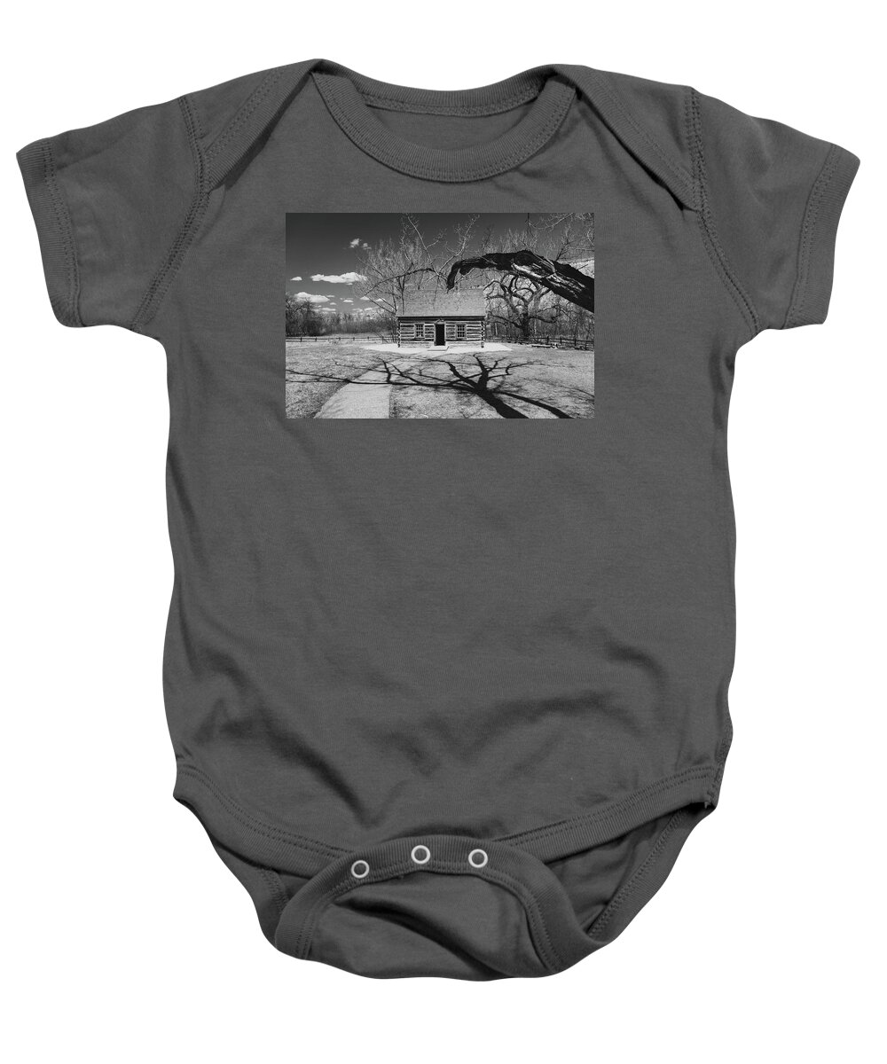 Black And White Cabin Baby Onesie featuring the photograph Black And White Maltese Cabin by Dan Sproul